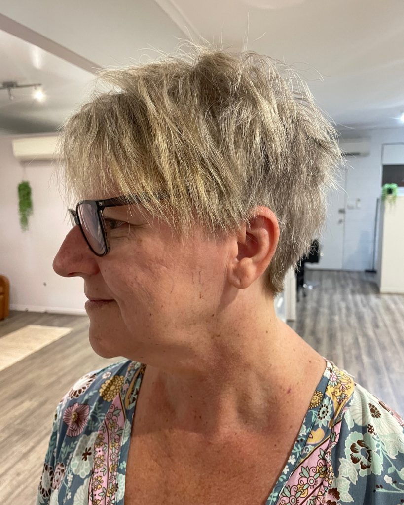 pixie cut for older ladies with glasses and frizzy hair