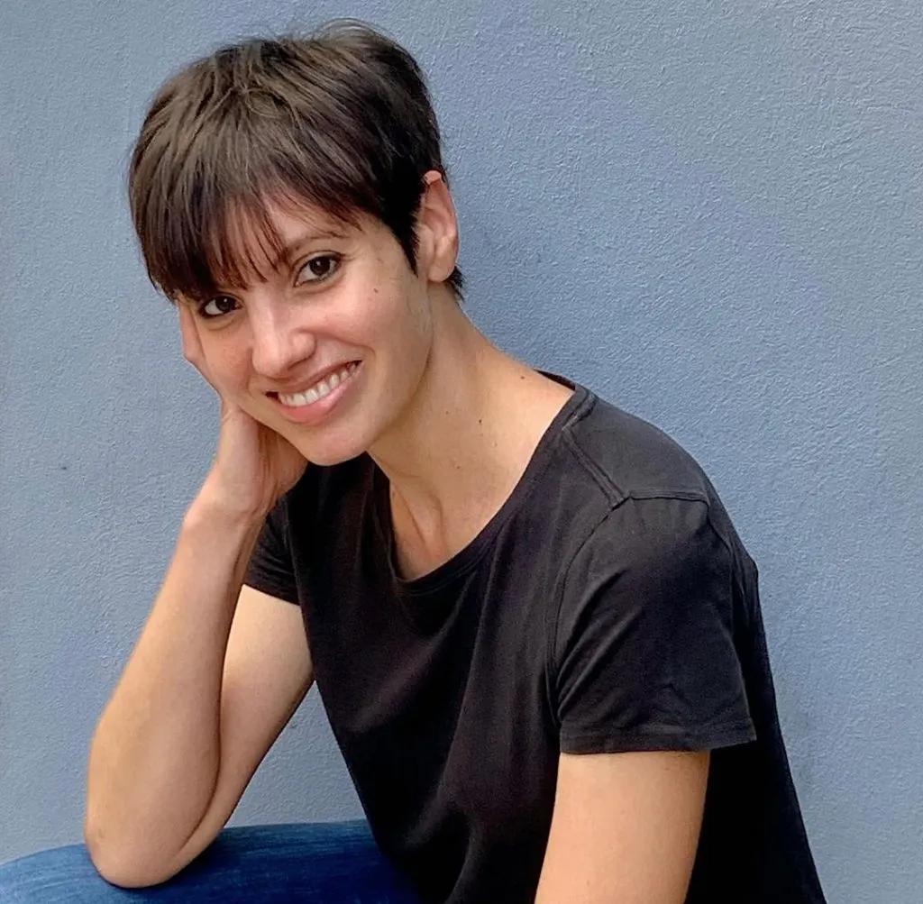 pixie cut with long razor bangs