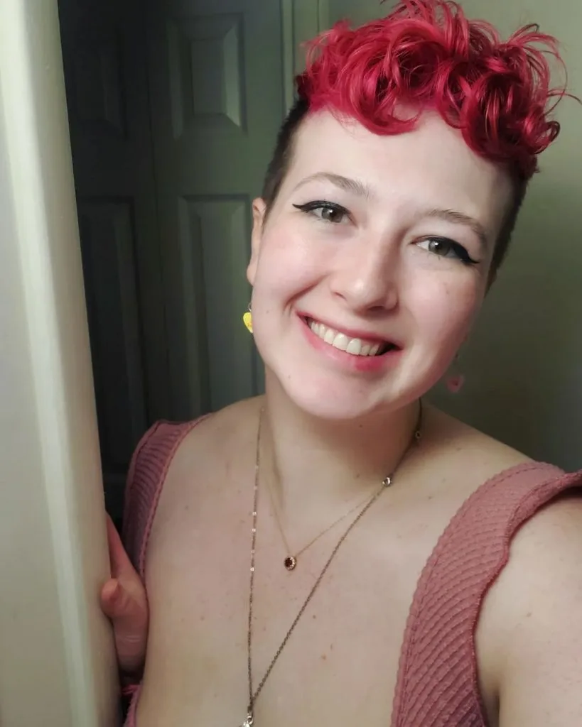 pixie with pink curly crown and shaved sides