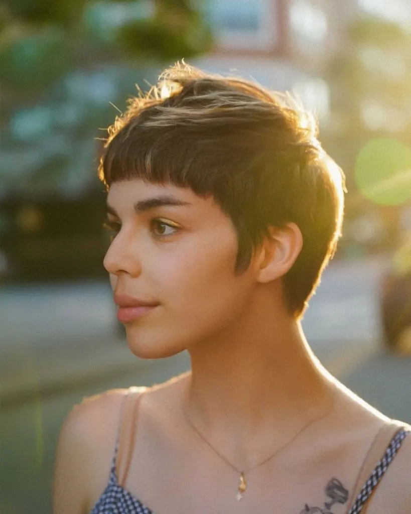 razored choppy pixie cut with sideburns