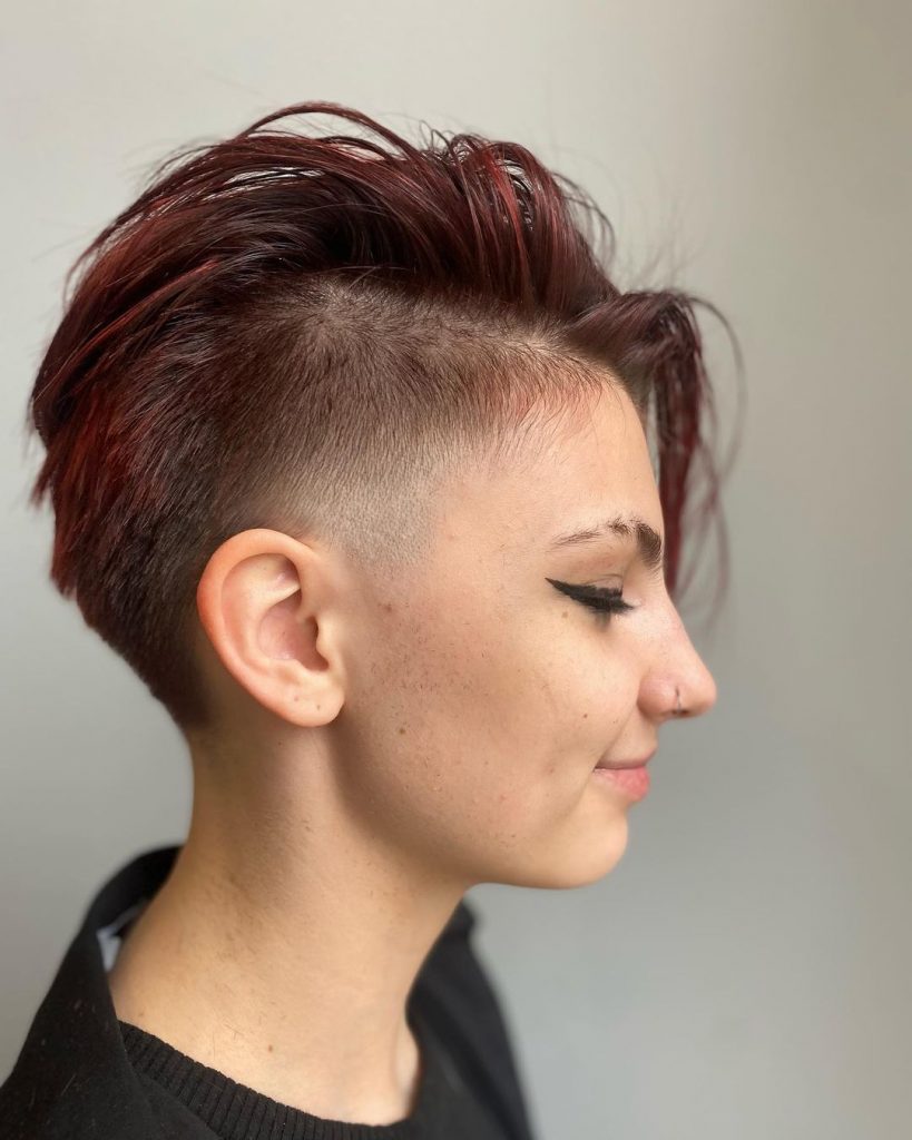 long red pixie cut with shaved side