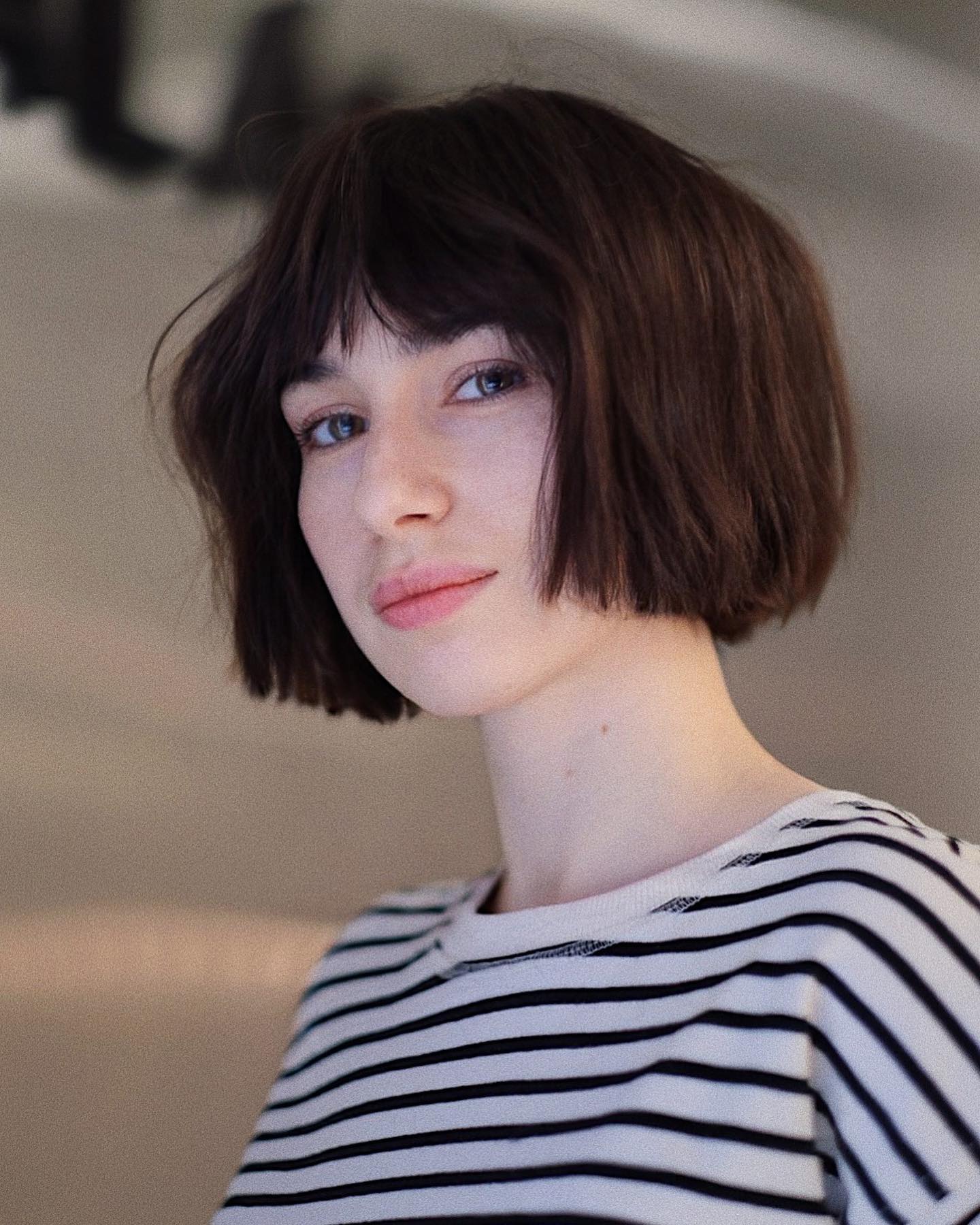 jaw-length blunt bob with bangs