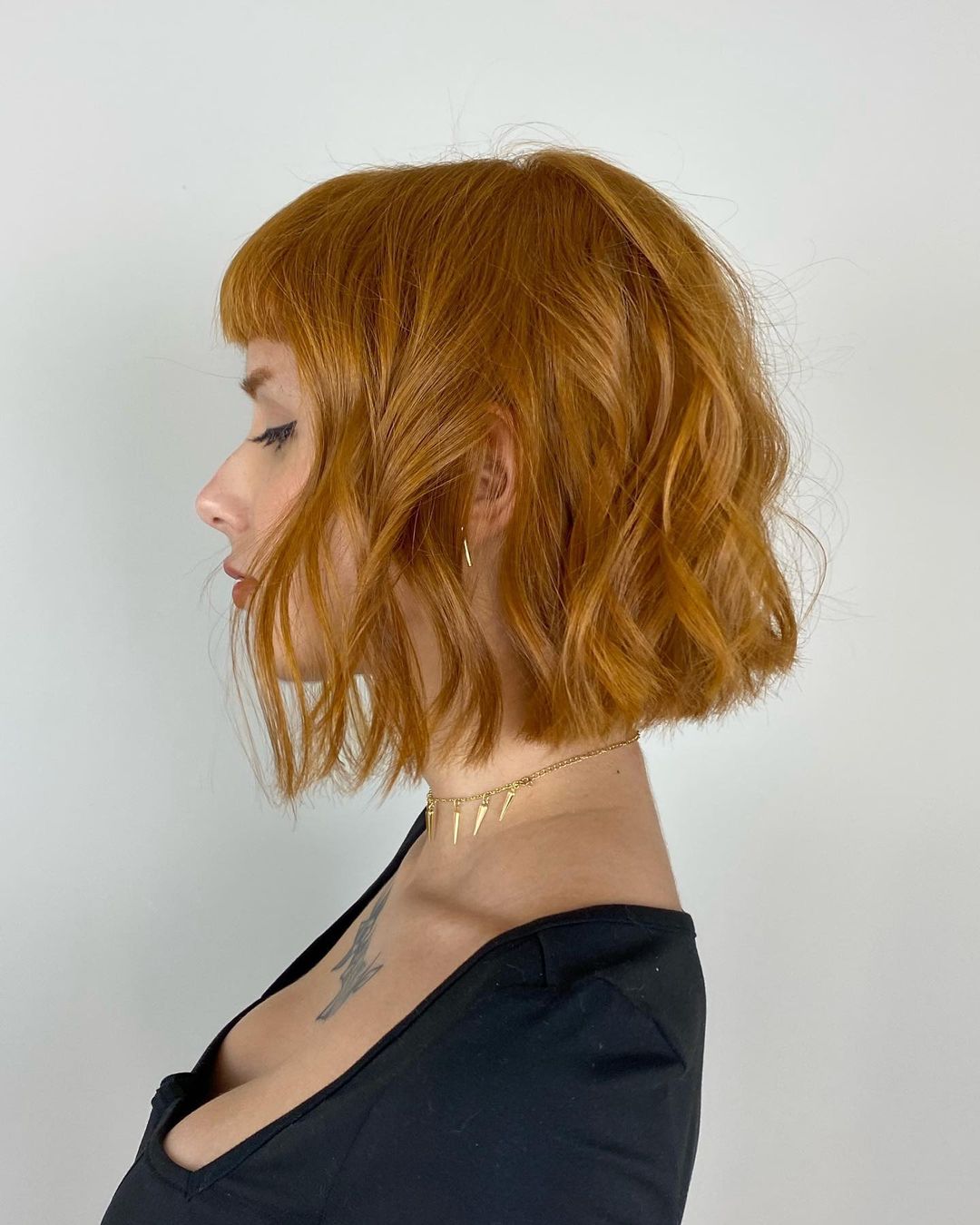 blunt lob with straight bangs