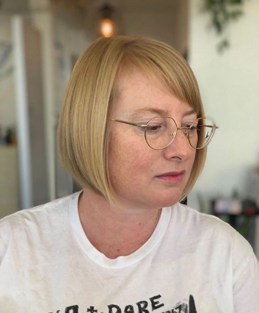 bob cut for round faces and glasses