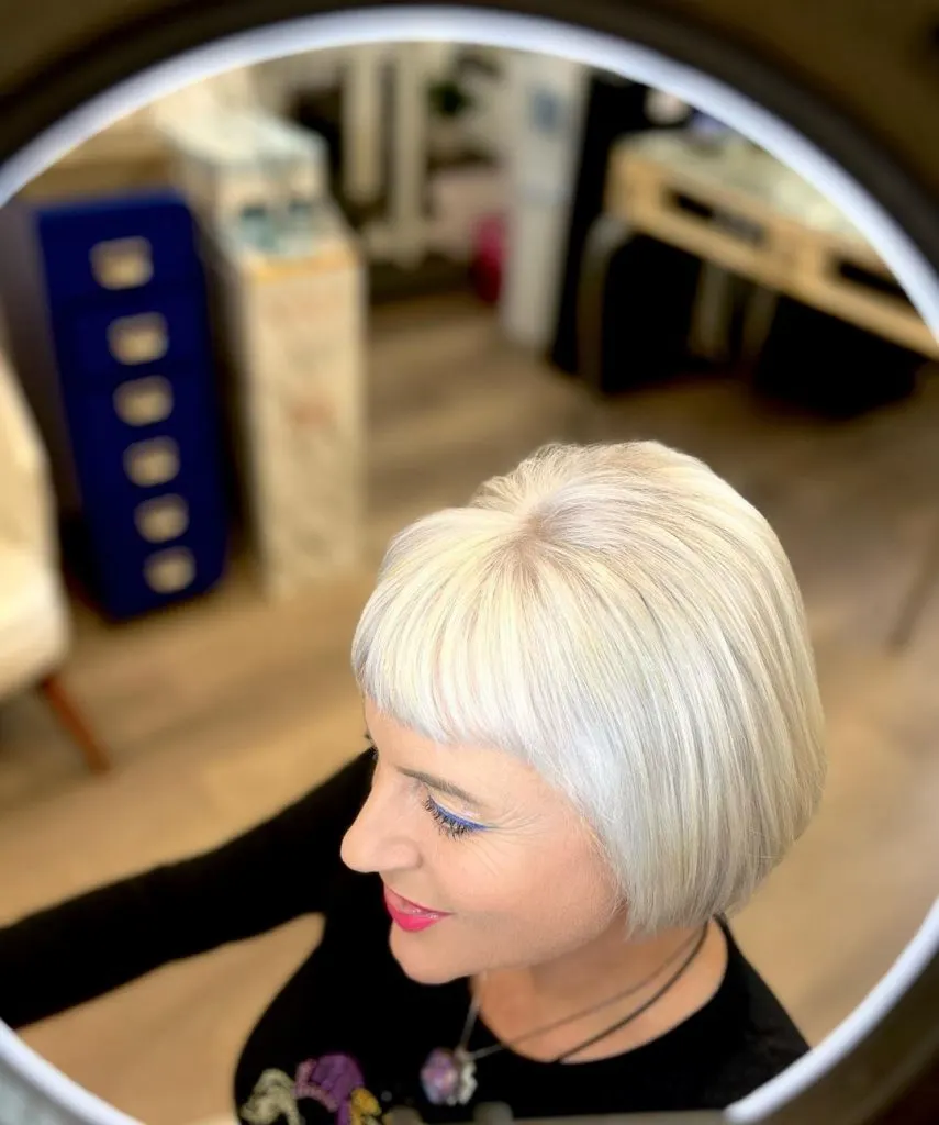 bob cut with straight bangs for older women