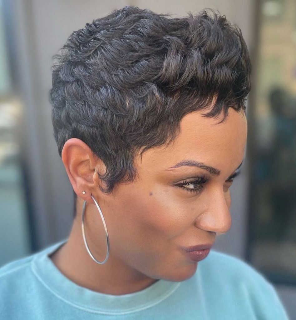 choppy curly short hairstyle for women over 40