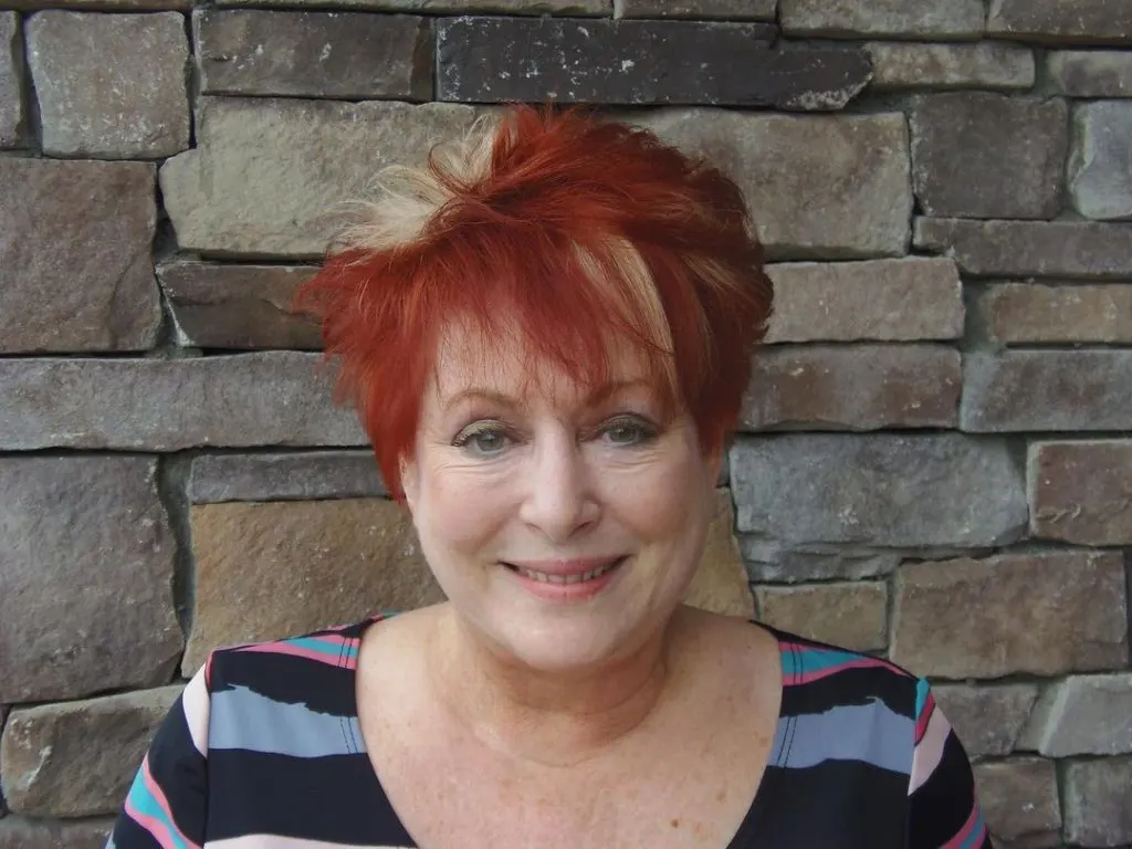 edgy blonde and copper short haircut for older women