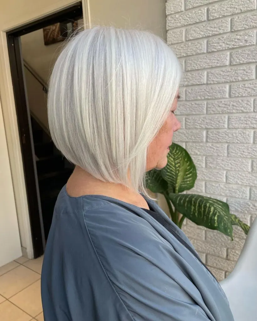 icy blonde long bob cut for older women