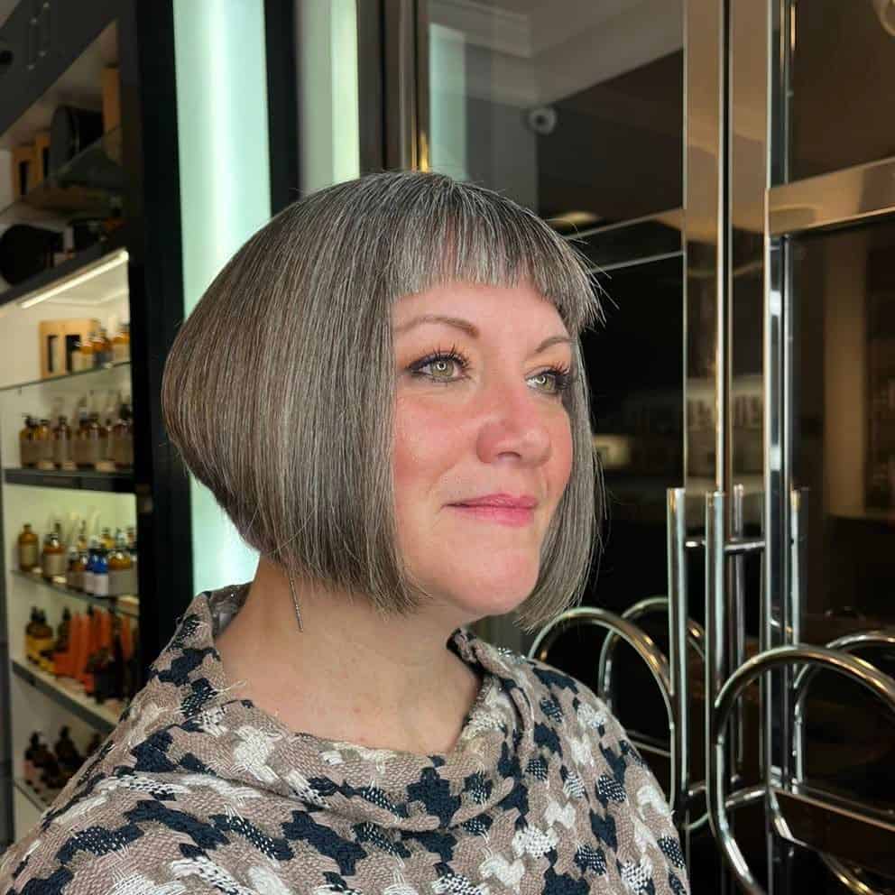 inverted bob with ultra short bangs for round faces