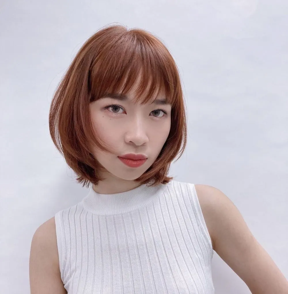 short bob with layers and wispy bangs
