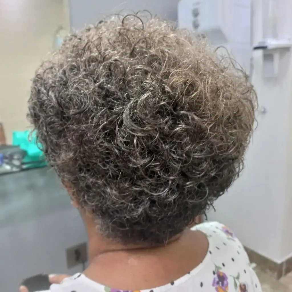 short pixie for older women with naturally curly hair