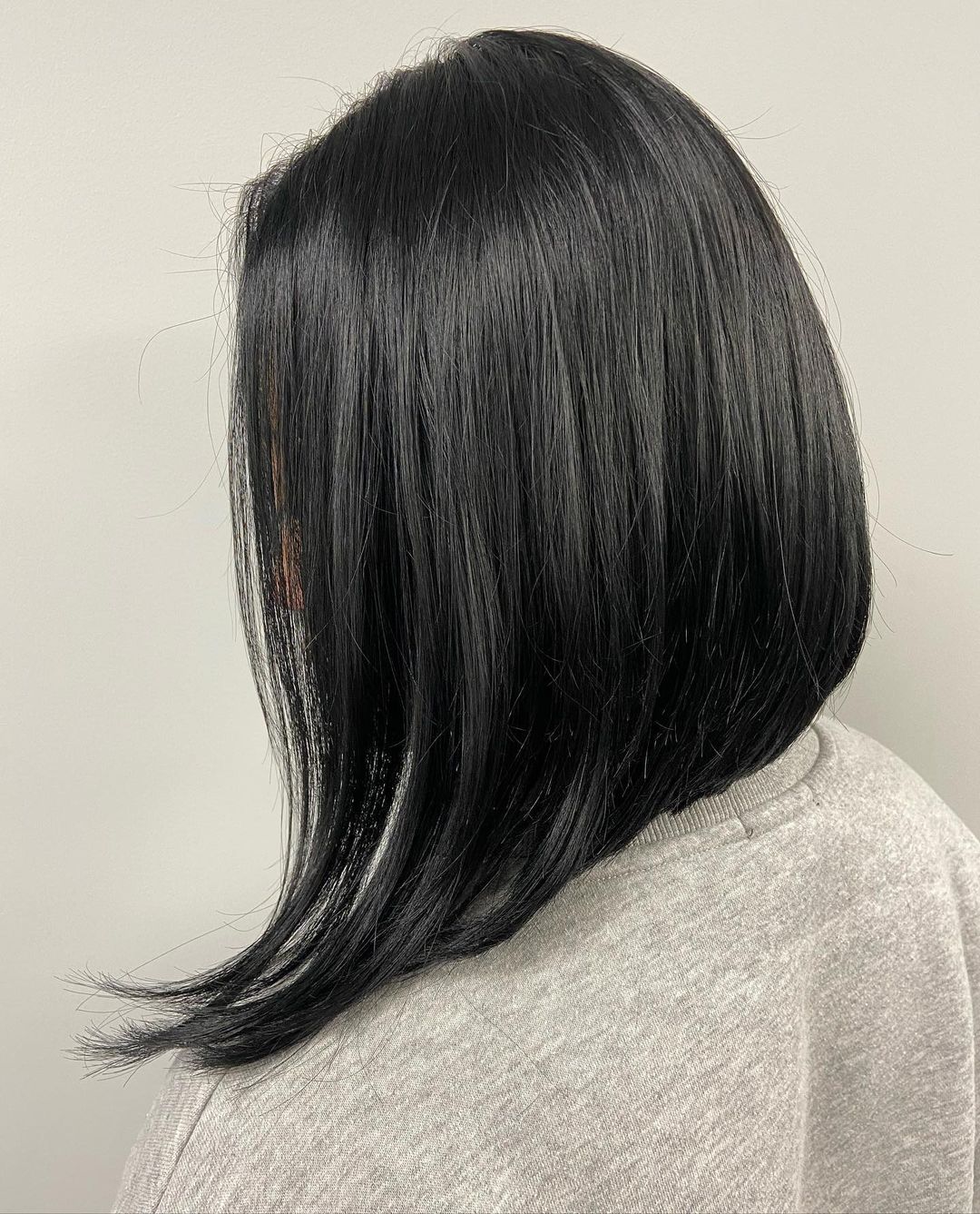 asymmetrical shoulder length bob