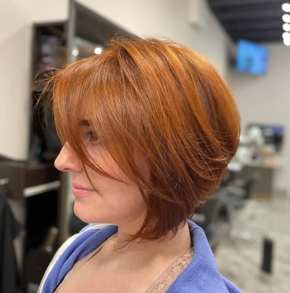 asymmetrical stacked bob with side bangs