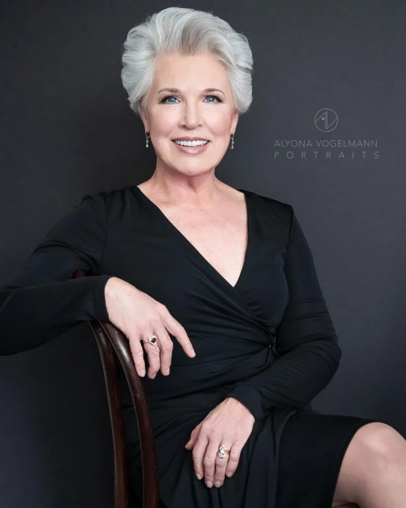 brushed up short hairstyle for women over 70 with fine hair