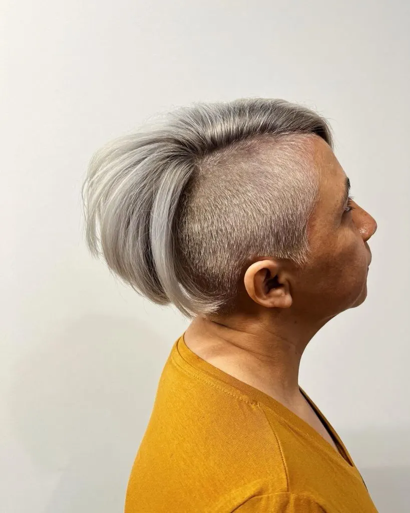 edgy pixie with shaved side for women over 60