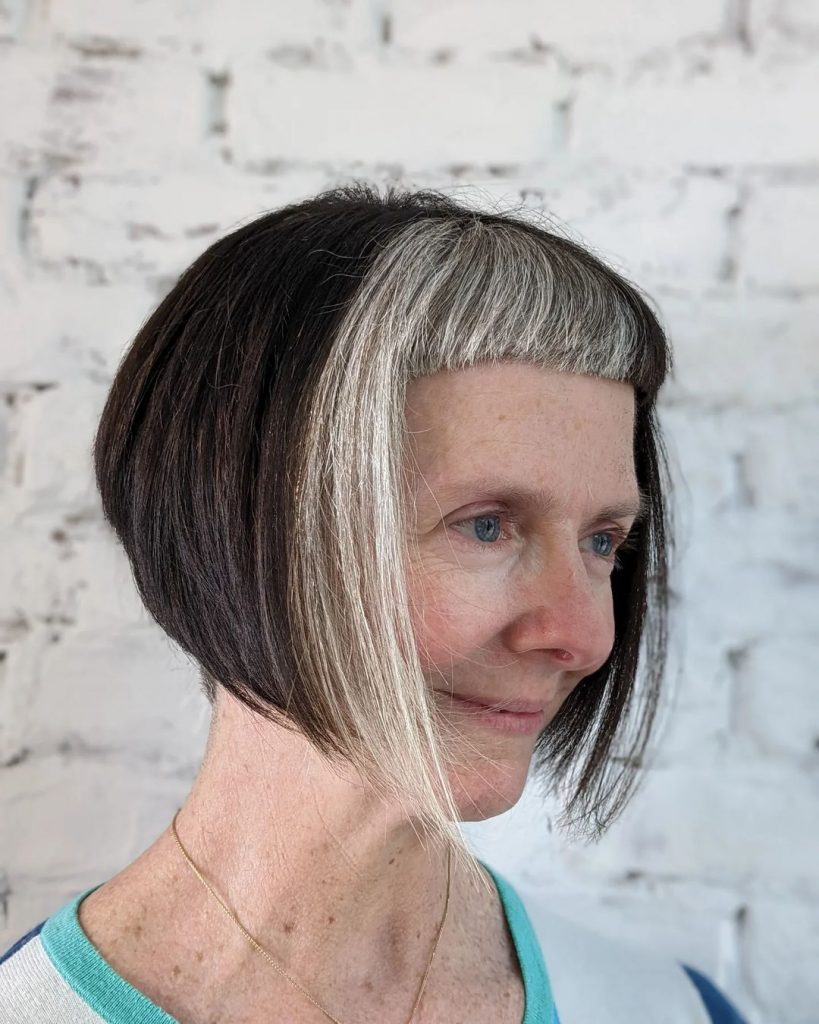 edgy short haircut with baby bangs for women over 60