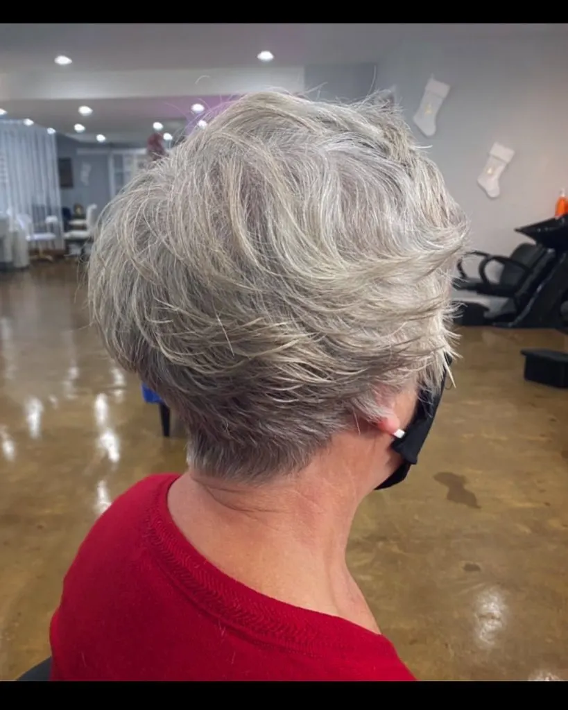 feathered short hairstyle for women over 70 with fine hair