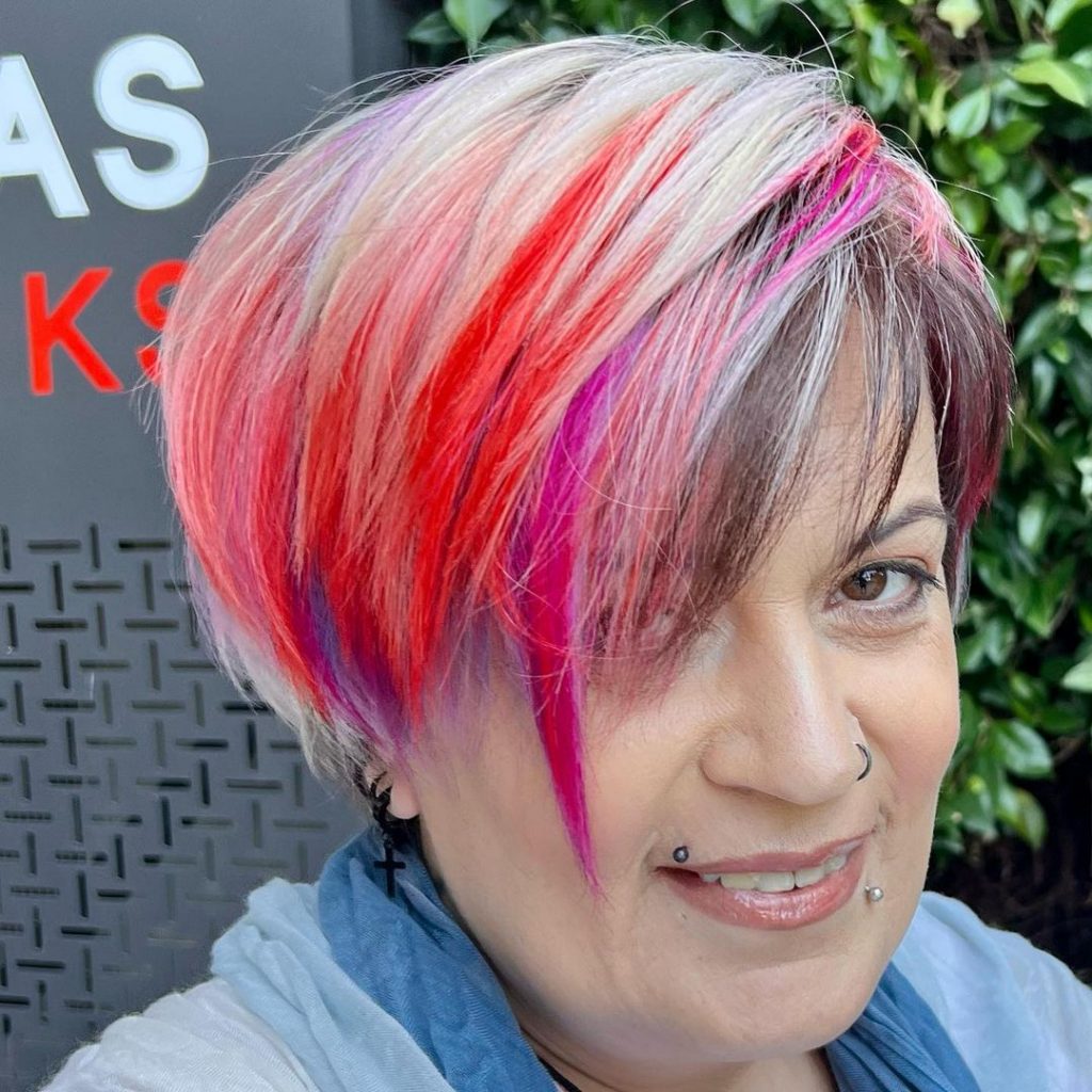 rainbow colored short haircut for women over 50