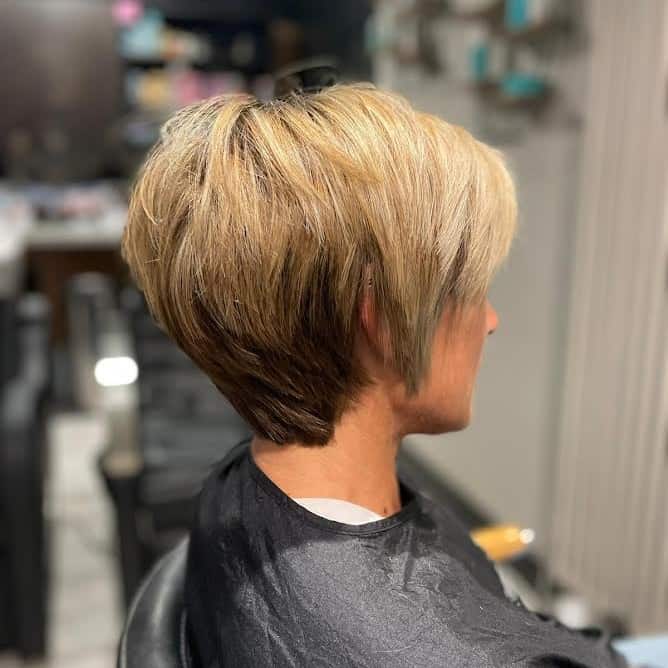 short haircut with long sideburns for women over 50