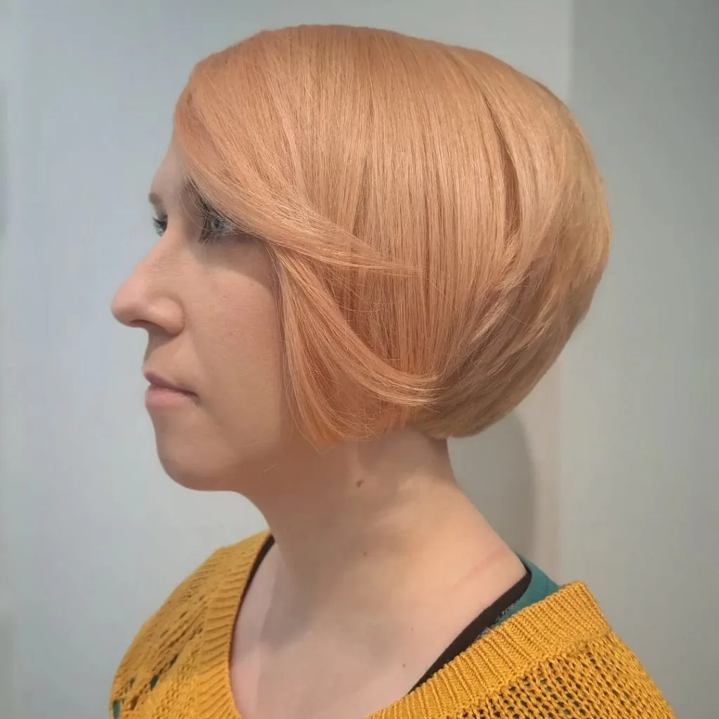 strawberry blonde bob cut for women over 50