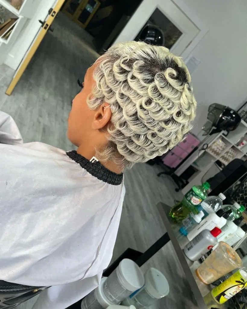 white blonde swirls and curls on short haircut