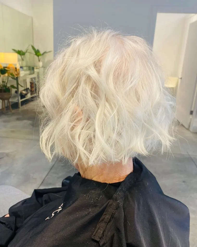 white curly bob cut for women over 60