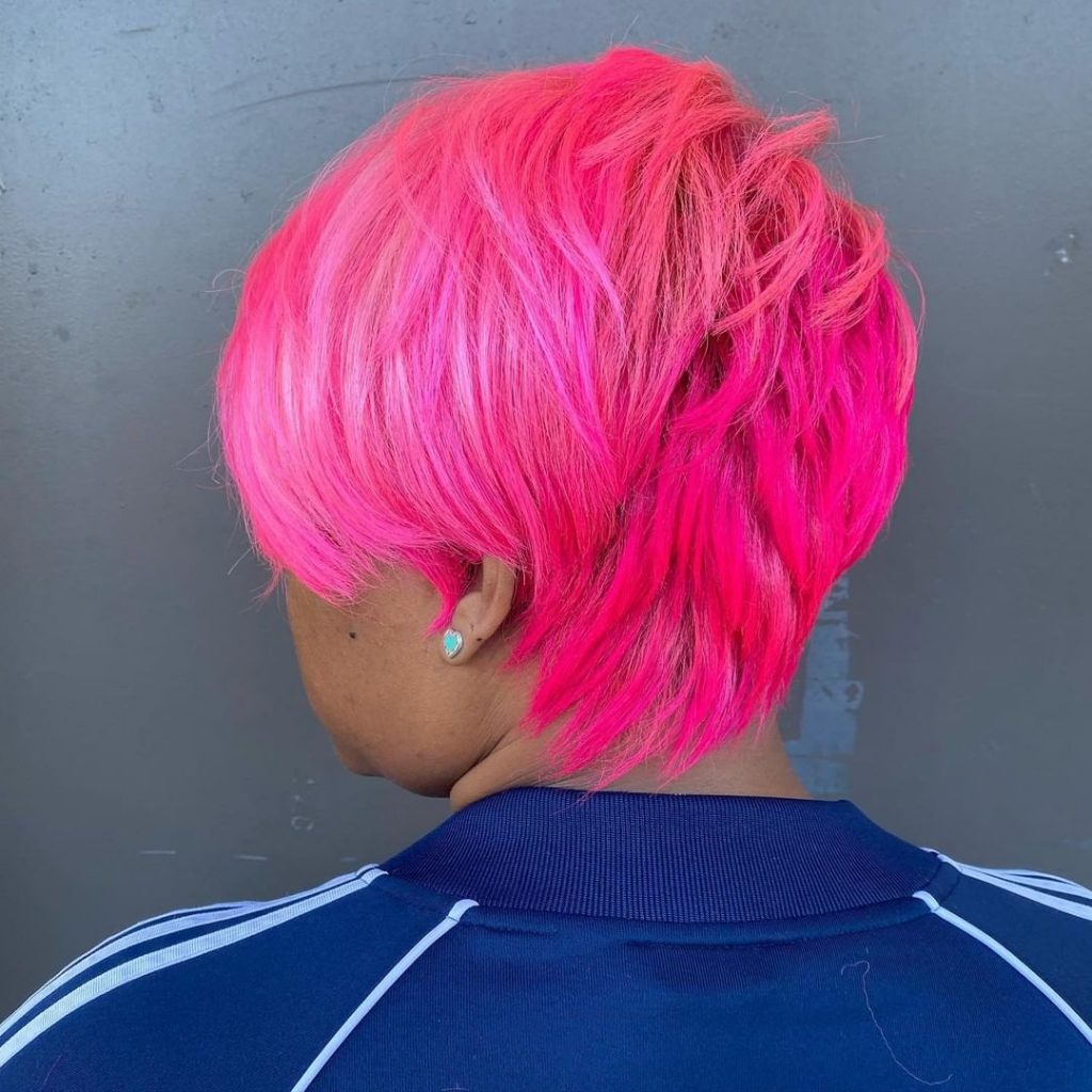 african american woman with vivid pink hair