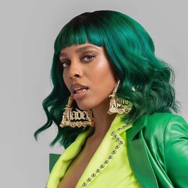 black woman with emerald green hair
