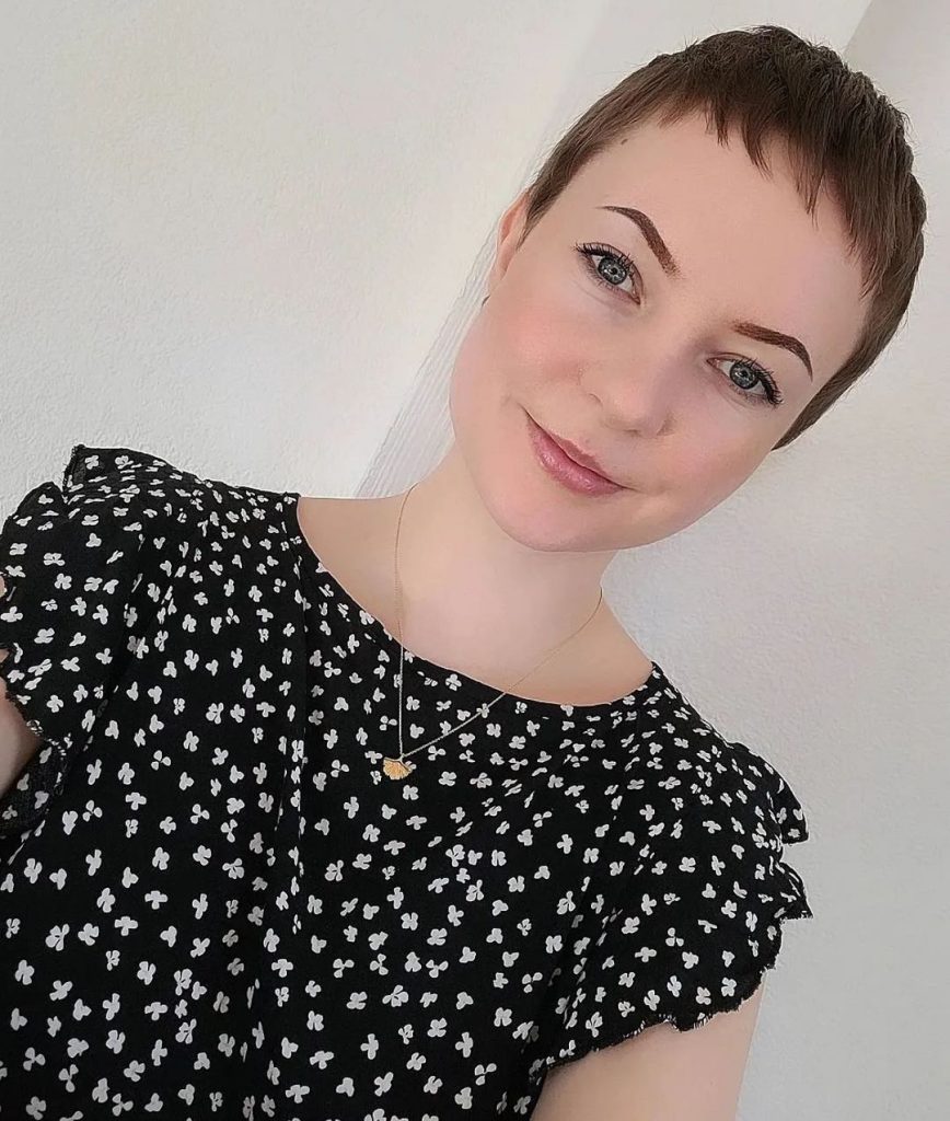 short pixie cut with baby bangs