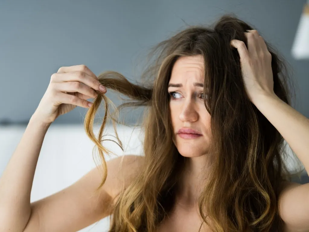 woman unhappy with her hair