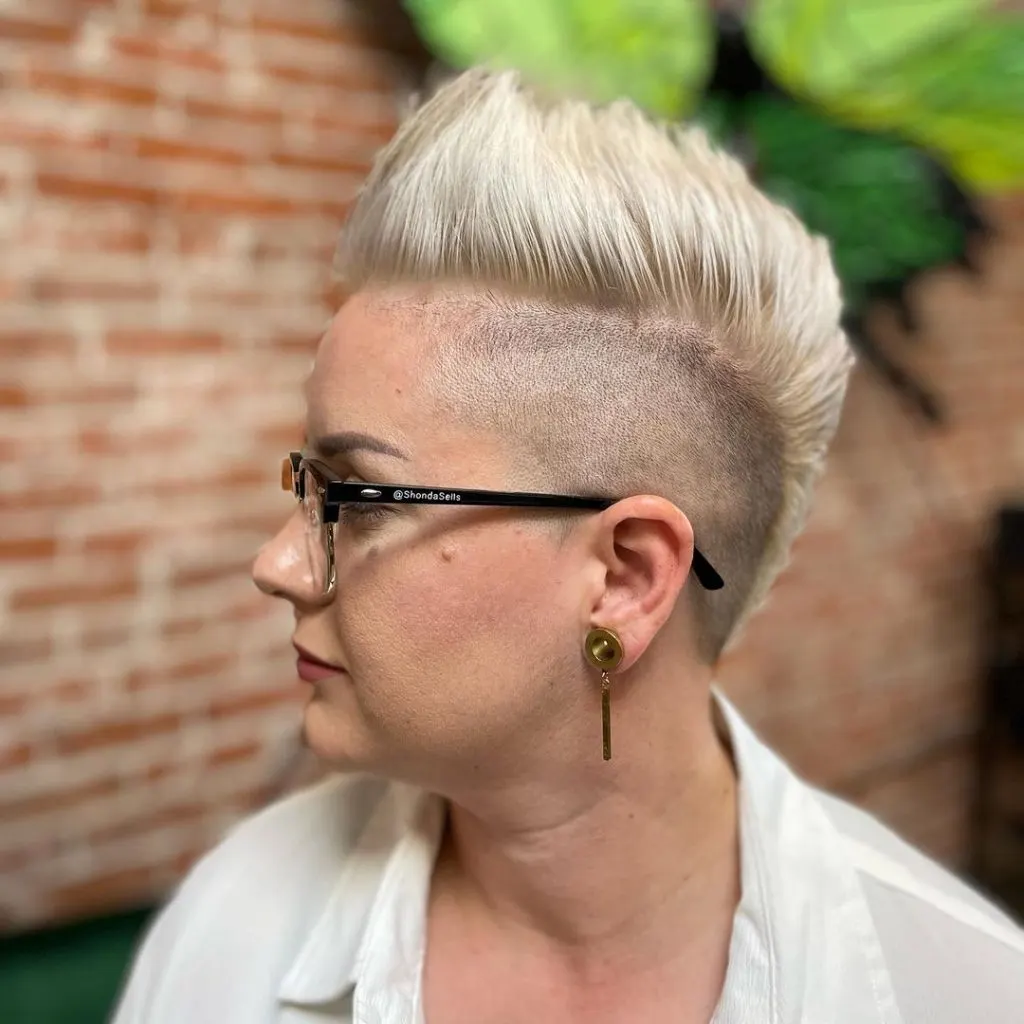 woman with a blonde edgy haircut