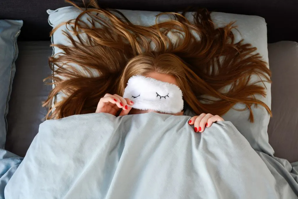 woman with long hair sleeping