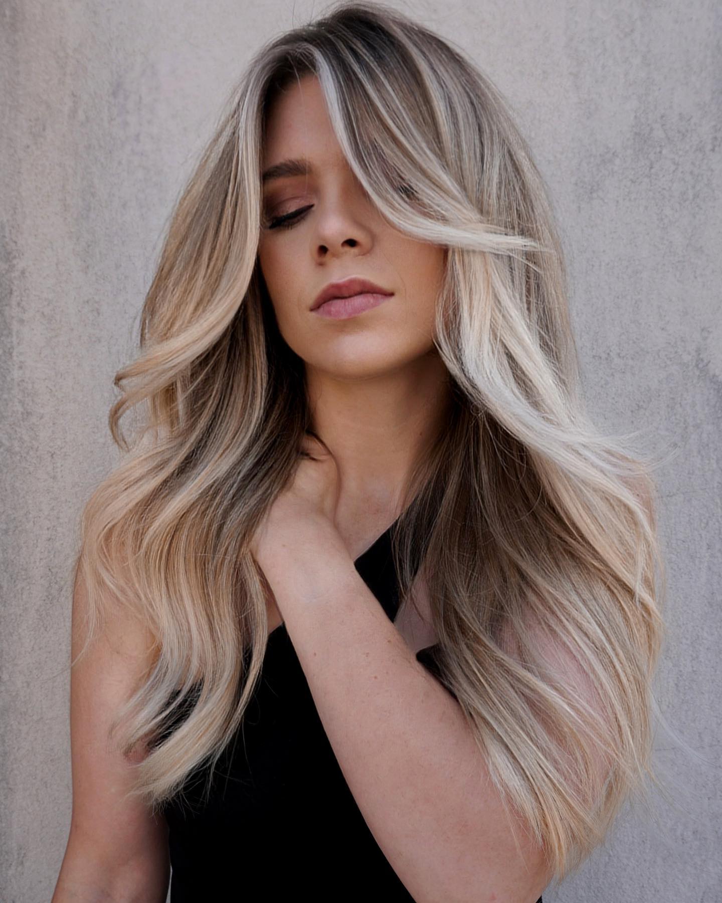 rooted light blonde