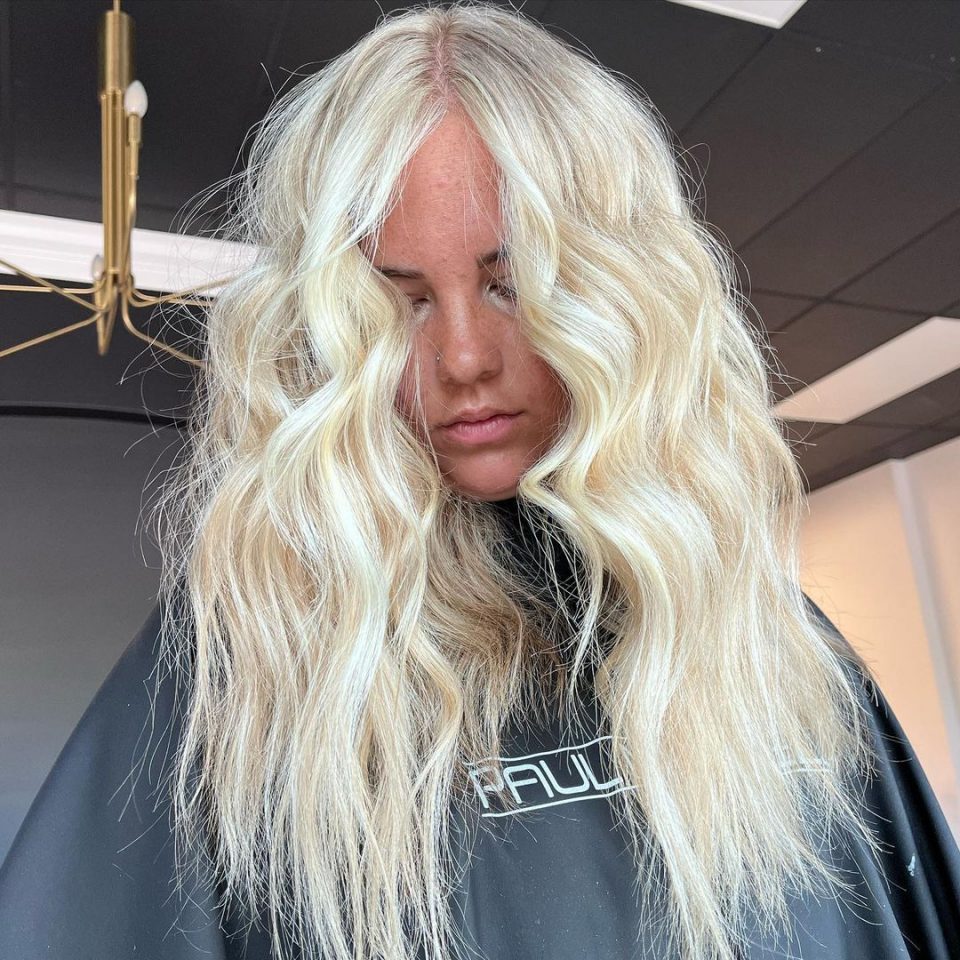 Close-up of a model with platinum blonde hair