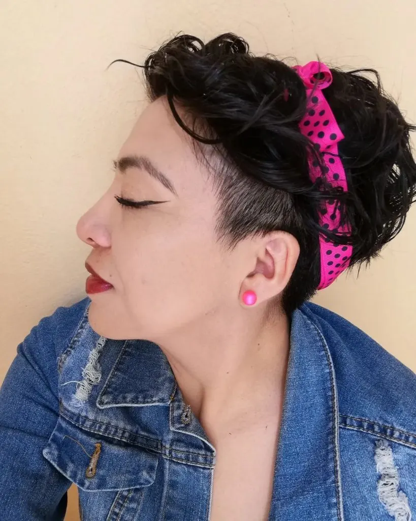 pixie cut with undercut and hair accessory