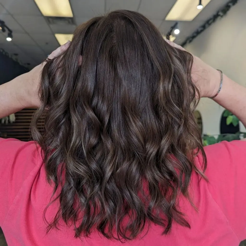 toffee highlights on long curly hair