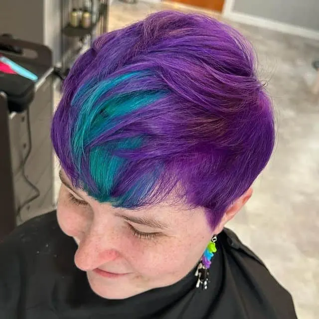 very short green and purple pixie haircut