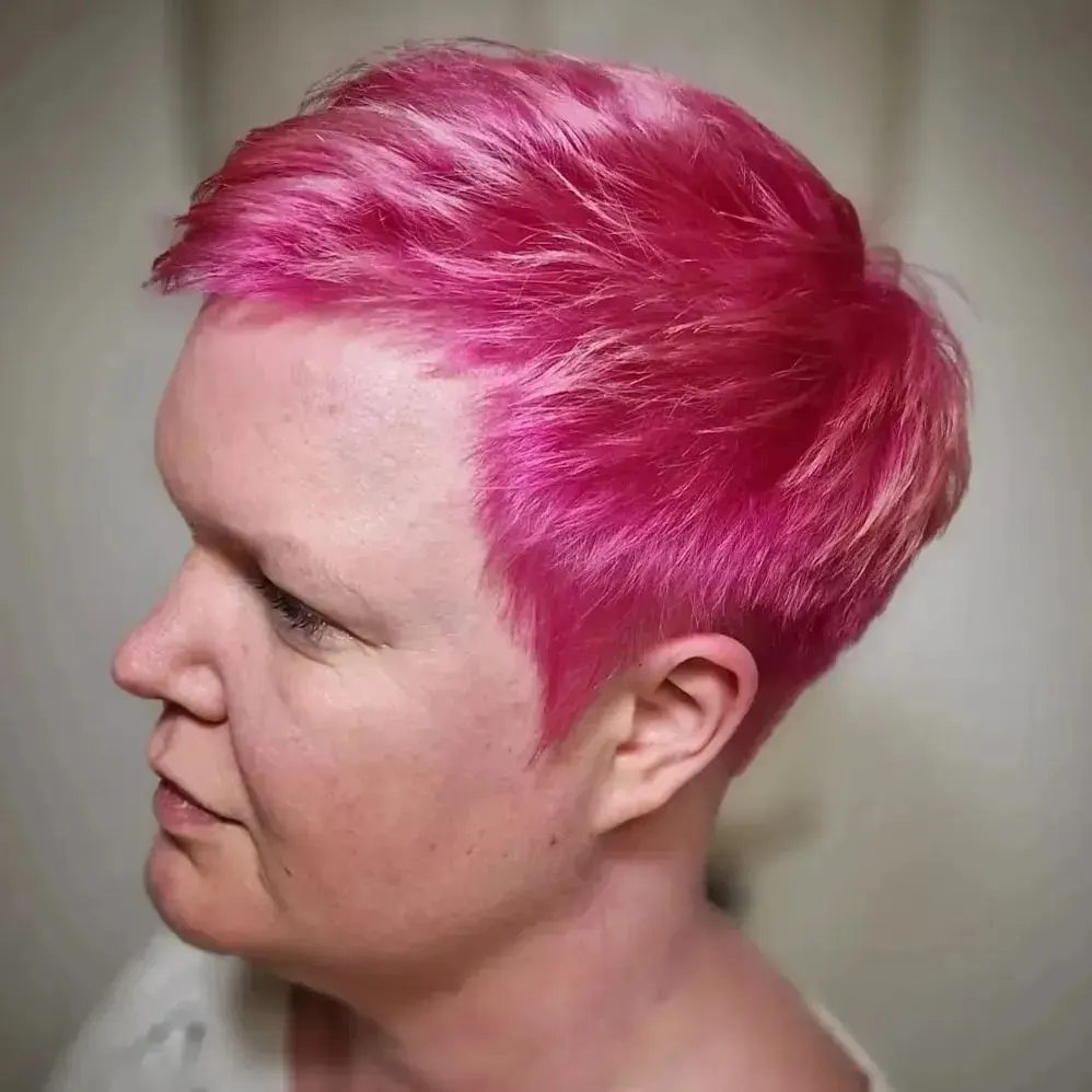 very short pink pixie haircut