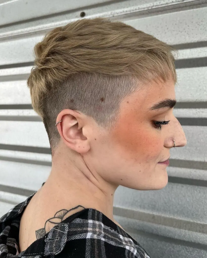 very short textured pixie with shaved sides