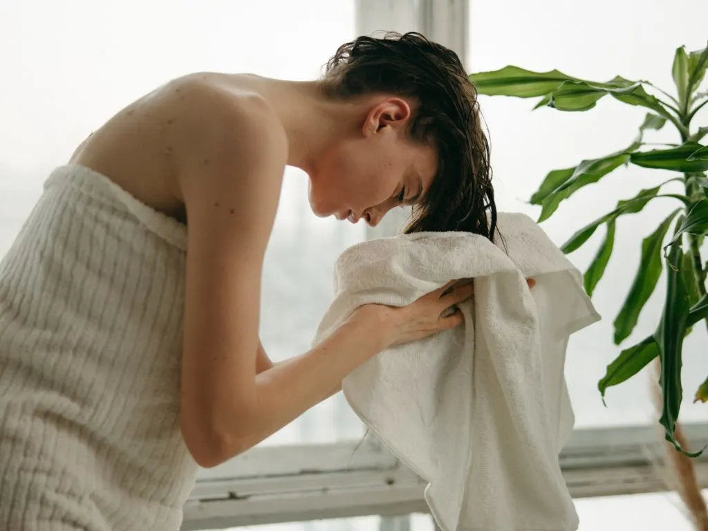 woman toweling her hair