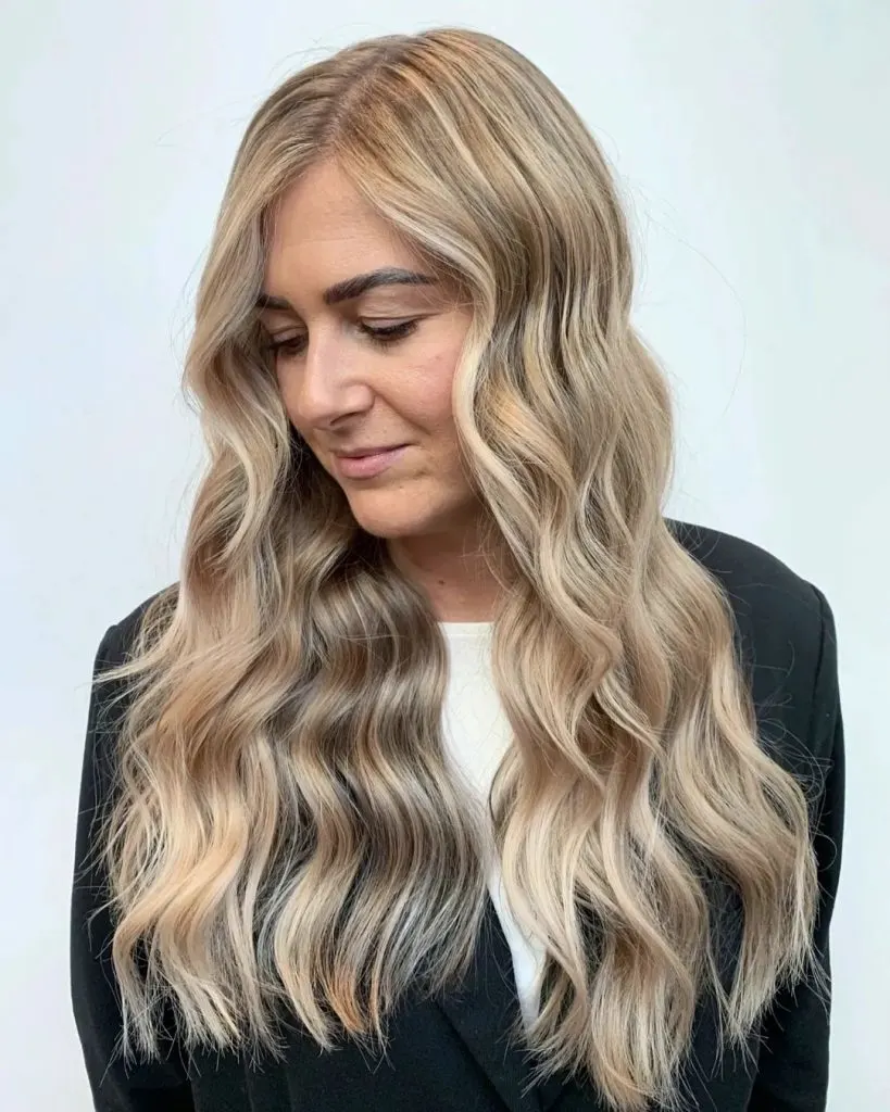 long wavy hair with blonde highlights