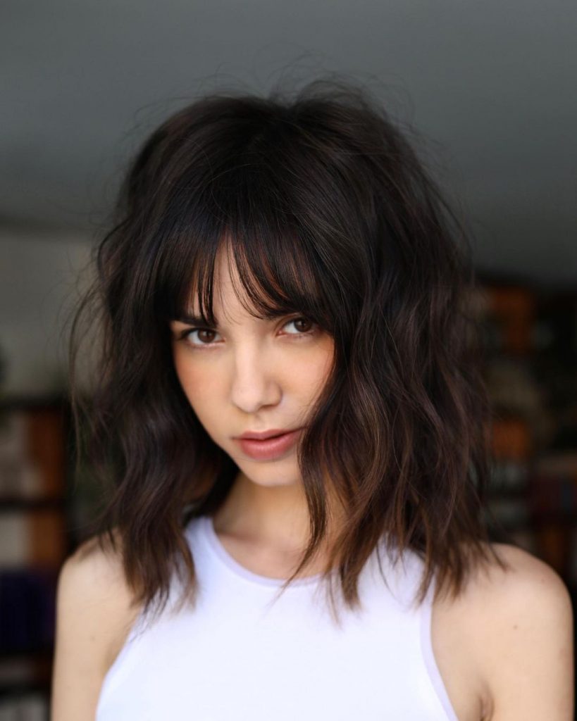 bangs for wavy hair and round face