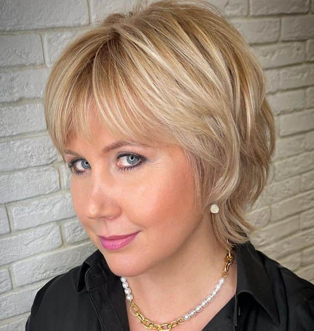 classy pixie cut with bangs for round face