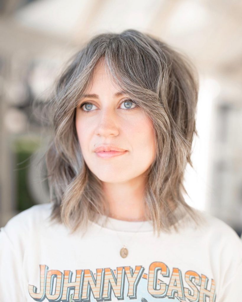 cute hairstyle with bangs on natural gray hair