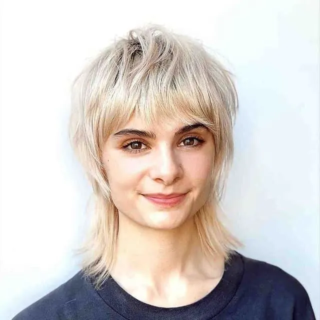 layered short razor cut with bangs