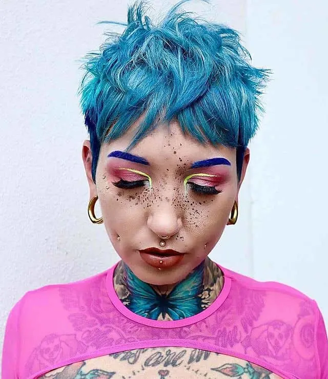 punk inspired blue layered pixie with bangs