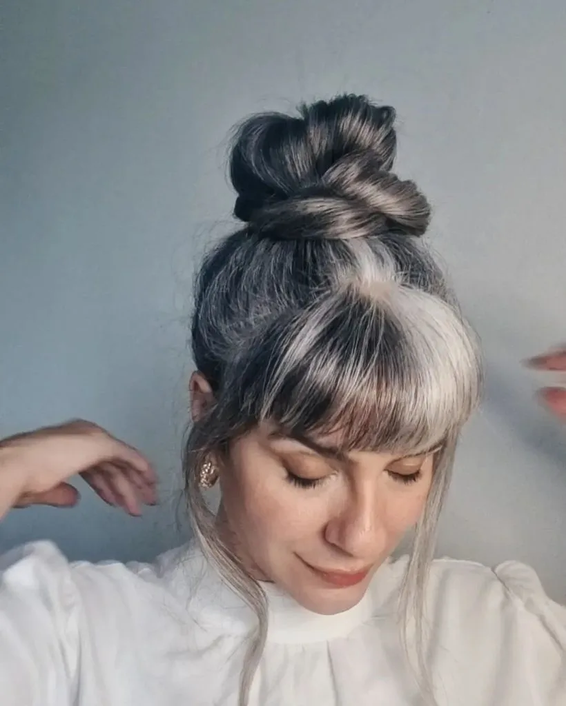 salt and pepper hair with bangs