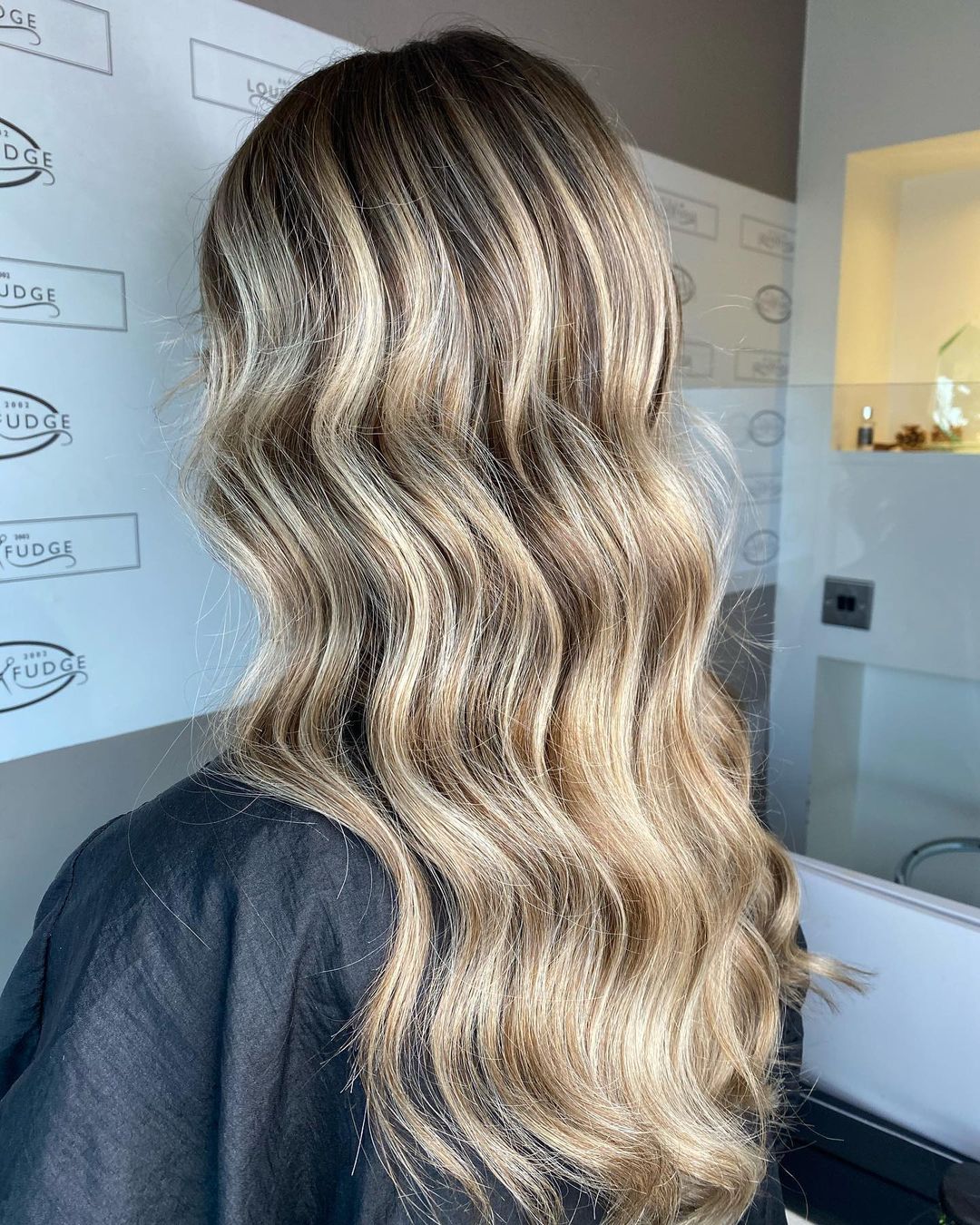 dirty blonde hair with root smudge