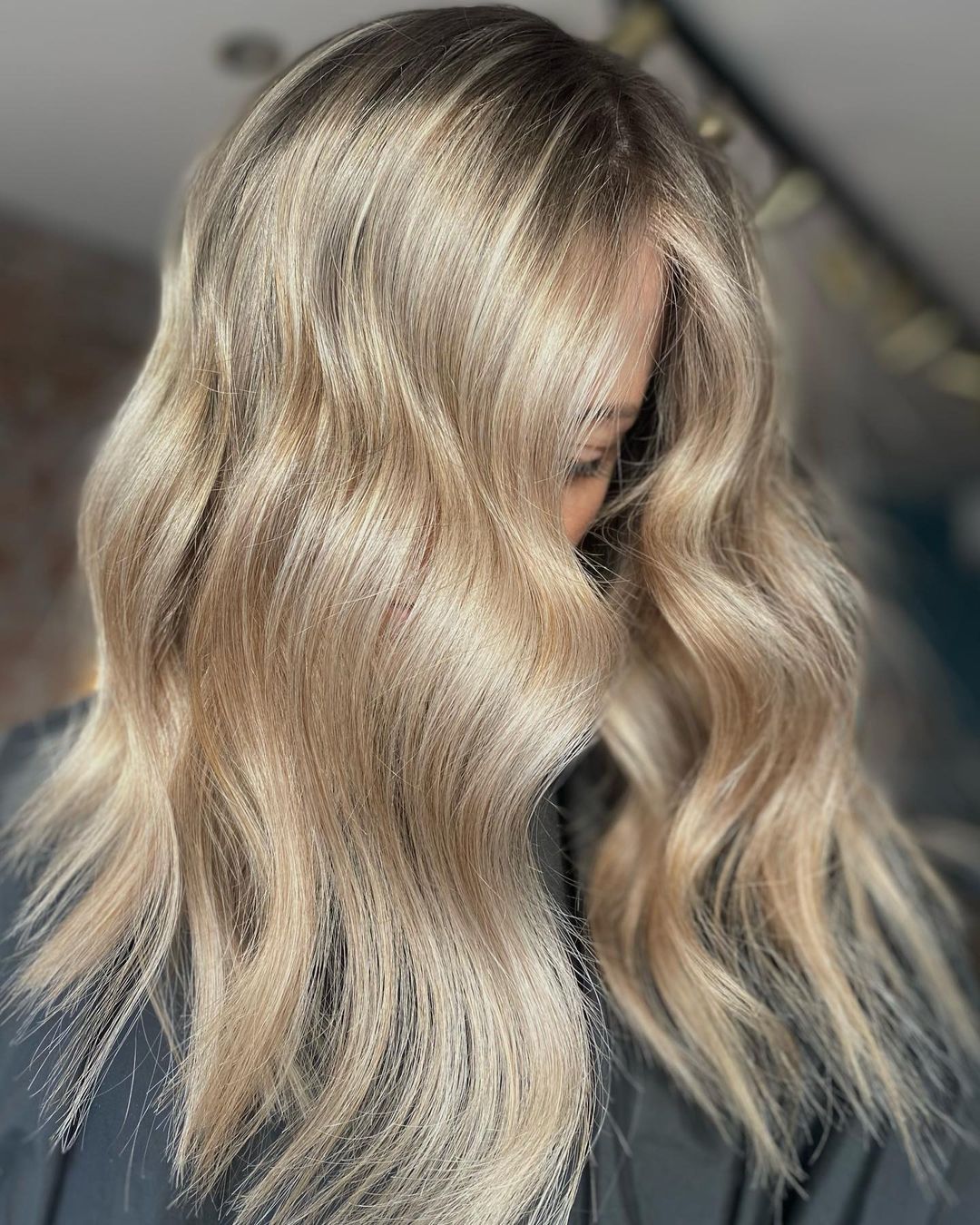 light dirty blonde with root shadow