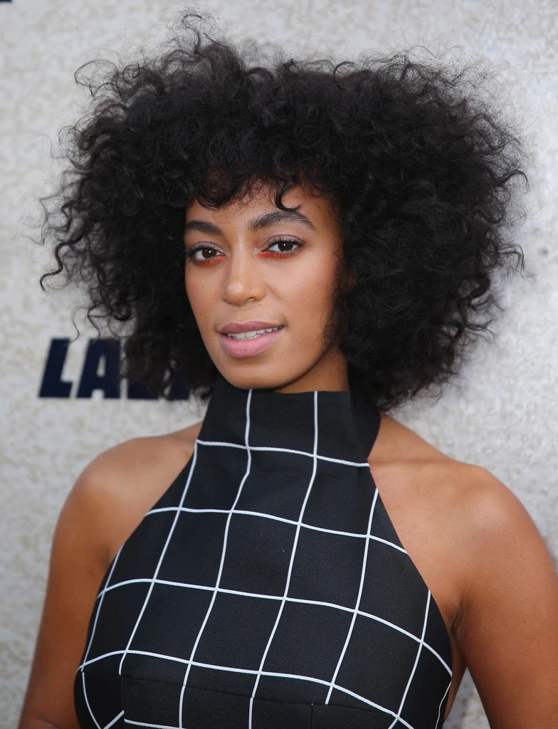 solange knowles with wispy curly bangs